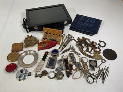 Lot 386 - An assortment of watches, clock keys and other...