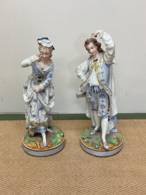 Lot 188 - A pair of Armand Marseille porcelain figurines,...