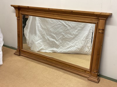Lot 527 - A decorative pine overmantel mirror with...