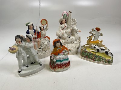 Lot 193 - A collection of five Staffordshire ceramic...