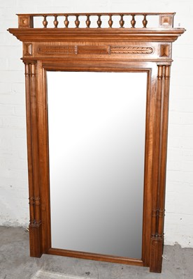 Lot 1455 - An Edwardian walnut pier glass, with bevelled...