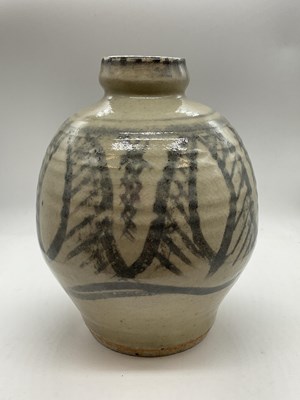 Lot 235 - A studio pottery vase with celadon/grey glaze...