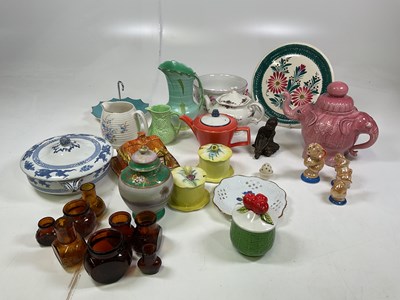 Lot 216 - A collection of ceramics and glass jars...