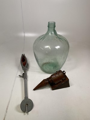 Lot 454 - A vintage glass carboy, height 55cm, a vintage...