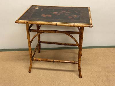 Lot 514 - An early 20th century bamboo occasional table...