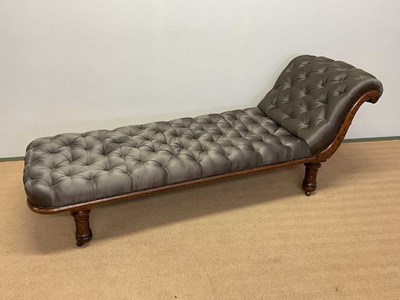 Lot 473 - A late Victorian oak day bed with buttoned...