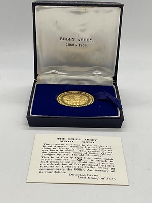 Lot 299 - JOHN PINCHES; a limited edition 22ct gold...