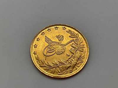 Lot 302 - A Turkish 100 kurush coin, approx 7.2g.