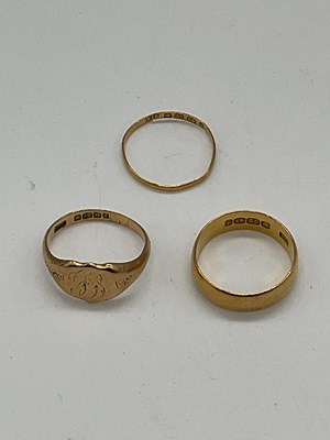 Lot 330 - A 22ct gold wedding band, size L, approx 3.7g,...