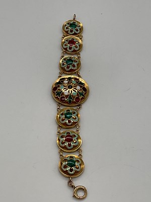 Lot 317 - A yellow metal and enamelled bracelet...