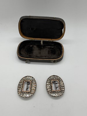 Lot 324 - A pair of George III paste set shoe buckles,...
