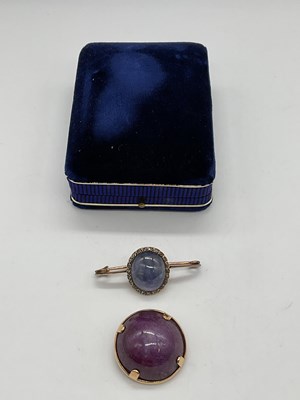 Lot 342 - A yellow metal foil backed brooch with 'star'...