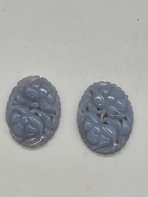 Lot 326 - An unusual pair of floral carved chalcedony...