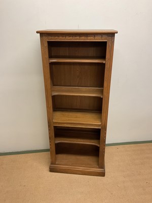 Lot 481 - ERCOL; a bookshelf, height 154cm, width 64cm,...