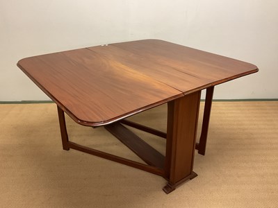 Lot 564 - A mahogany drop leaf table, height 76cm, width...