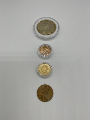 Lot 305 - A Victorian 1887 silver crown and three tokens...