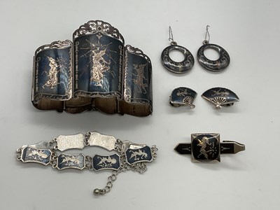 Lot 363 - A Siam sterling silver niello cuff bracelet, a...