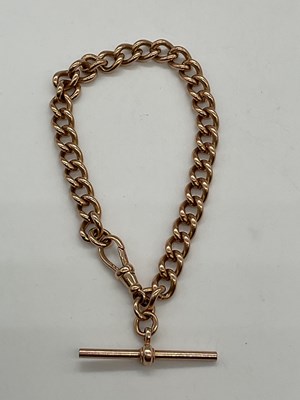 Lot 311 - A 9ct yellow gold curb link bracelet with...