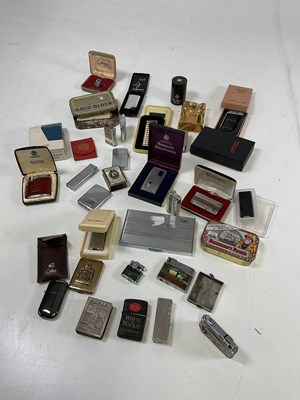 Lot 10 - A group of vintage lighters including a 1950s...