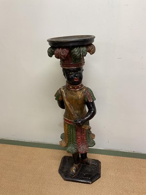 Lot 462 - A carved, painted and decorative figural stand...