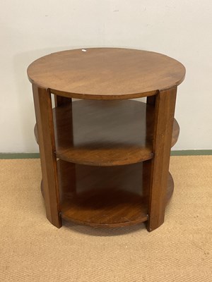 Lot 507 - An Art Deco mahogany three tier circular table,...