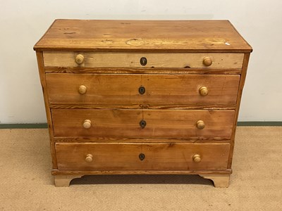 Lot 513 - A pine chest of four long drawers, height 77cm,...