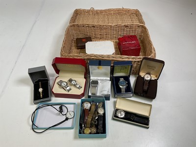 Lot 377 - A wicker basket containing several watches, a...