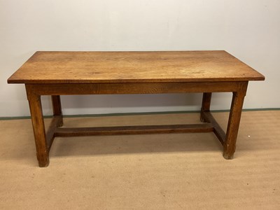 Lot 469 - An oak farmhouse table with single end drawer,...