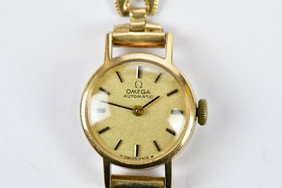 Lot 594 - OMEGA; a lady's 9ct gold wristwatch, the dial...