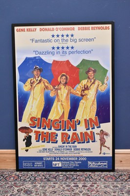 Lot 438 - A reproduction "Singing in the Rain" film...