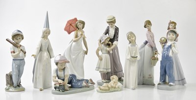 Lot 1260 - LLADRO; a collection of ten figures, to...