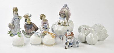 Lot 1261 - LLADRO; a group of six figures to include...