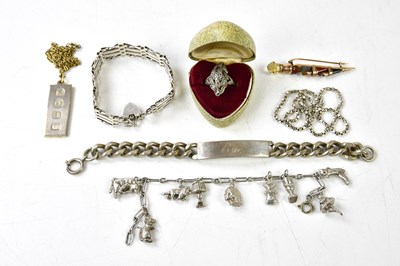 Lot 1161 - A collection of silver and white metal...