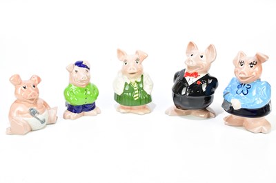 Lot 1295 - WADE; a family of Nat West pig money banks and...