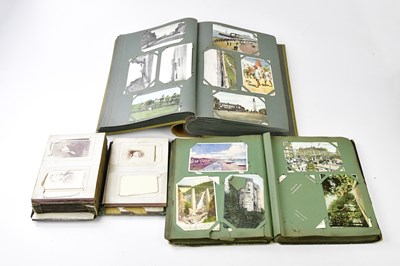 Lot 439 - A collection of mixed postcards and photos...