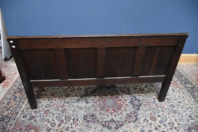Lot 8 - An 18th century oak settle with four panel...