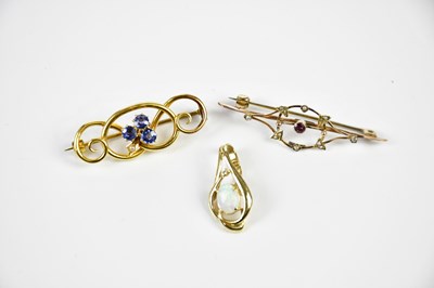 Lot 438 - Two yellow metal brooches and a 14ct yellow...