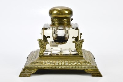 Lot 1287 - A 19th century brass desk stand housing a...