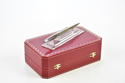 Lot 803 - CARTIER; a limited edition engraved platinum...
