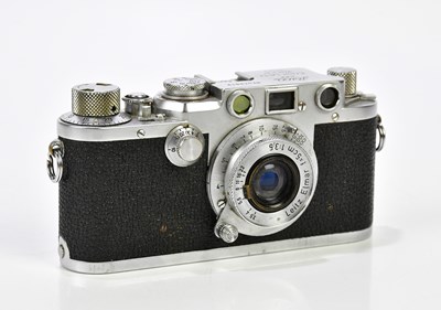 Lot 1393 - LEICA; a Leica IIIf rangefinder 35mm film...