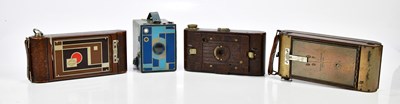 Lot 1385 - Four Art Deco era cameras, to include a Ensign...