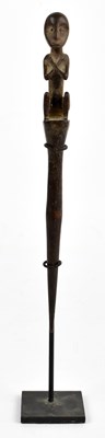 Lot 568 - A Dayak People, Borneo figural spike on custom...