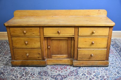 Lot 1168 - A Victorian pine dresser base with an...