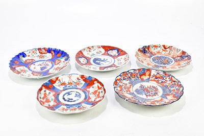 Lot 1353 - Five 20th century Japanese Imari wall chargers,...