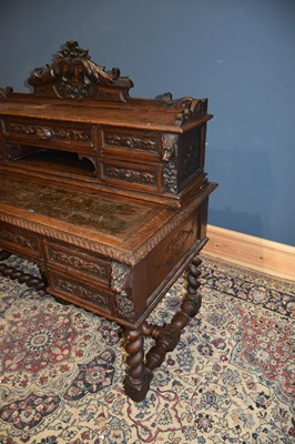 Lot 24 - A 19th century Flemish style carved oak desk...