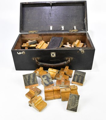 Lot 273 - An ebonised wooden box containing various...