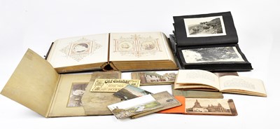 Lot 450 - A Victorian photograph album containing family...