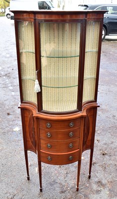 Lot 1694 - An Edwardian mahogany serpentine display...