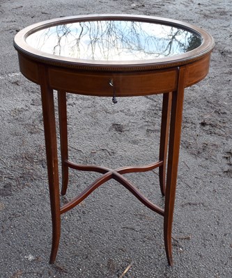 Lot 1688 - An Edwardian mahogany oval bijouterie table,...