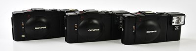 Lot 1416 - OLYMPUS; three Olympus 35mm film cameras, to...